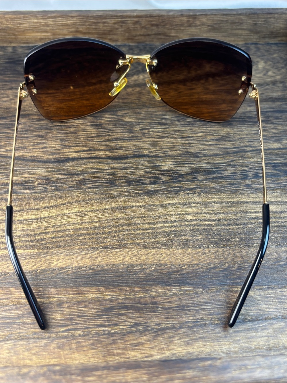 Tory Burch Brown Gradient Rimless Sunglasses with Gold Accents and Orange Case - Picture 5 of 10